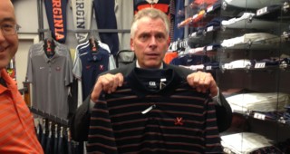 Are the orange stripes too much? Governor Terry McAuliffe checks out polos at Mincer's.
Staff photo