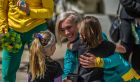 ACT Olympians and Paralympians were officially welcomed back to Canberra at Floriade. Caroline Buchanan gets hugs from ...