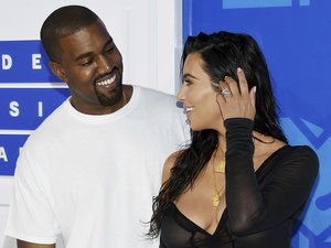 Kanye West and Kim Kardashian West arrive at the MTV Video Music Awards at Madison Square Garden on Sunday, Aug. 28, 2016, in New York