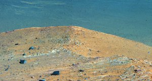 This scene from the panoramic camera (Pancam) on NASA's Mars Exploration Rover Opportunity shows "Spirit Mound" overlooking the floor of Endeavour Crater. The mound stands near the eastern end of "Bitterroot Valley" on the western rim of the crater, and this view faces eastward.