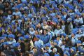 Blues fans cheer during game three.