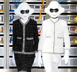 Models wear a creation for Chanel's Spring-Summer 2017 ready-to-wear fashion collection presented Tuesday, Oct.4, 2016 ...