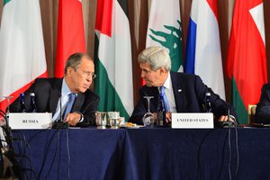 File - U.S. Secretary of State John Kerry, alongside Russian Foreign Minister Sergey Lavrov attends the International Syria Support Group meeting, at the Palace Hotel, in New York City, New York on September 22, 2016.