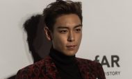 South Korean singer and actor T.O.P. curated a Sotheby's auction in Hong Kong last week. AFP PHOTO / ANTHONY WALLACE