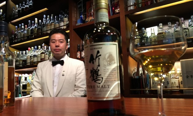 Mizunara: The Library's bartender-in-chief, Endo San, casts an eye over his favourite Asian tipple: the Nikka Taketsuru 17-year-old. Photo: Kenny Hodgart