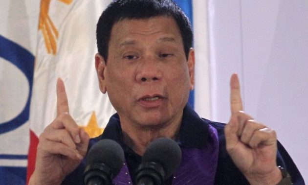 Philippines President Rodrigo Duterte gestures while delivering a speech before female police officers in Davao city on September 30. REUTERS/Lean Daval Jr