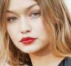 Gigi Hadid sporting on trend red lips at the Giambattista Valli.