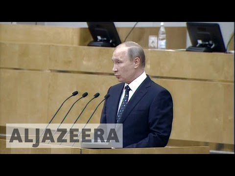 Putin calls for stronger Russia at parliament opening