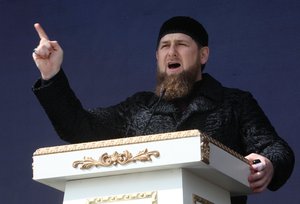 Chechen regional leader Ramzan Kadyrov addresses a rally marking the 13th anniversary of the adoption of the Constitution of Russian region of Chechnya, in the regional capital of Grozny, Russia