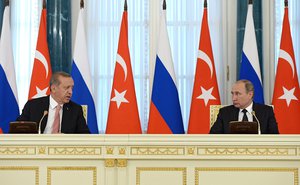 Russian President Vladimir Putin and his Turkish counterpart Recep Tayyip Erdogan hold a joint press conference in St Petersburg, Russia, 9 August, 2016.