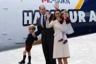 Britain's Prince William, Catherine, Duchess of Cambridge, Prince George and Princess Charlotte board a floatplane for ...