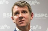 NSW Premier Mike Baird, right, joined by Nationals leader Troy Grant, left, and RSPCA chief executive Steven Coleman, ...