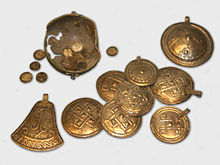 Iron Age metal plates and buttons from a hoard