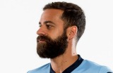 Western Sydney Wanderers captain Nikolai Topor-Stanley, left, and Sydney FC captain Alex Brosque will led their team out ...