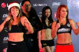 Mixed Martial Arts fighter Angela Lee, left, of Singapore, and Lena Tkhorevska of Poland after the official weigh-in ...