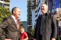 Education Minister James Merlino and Housing Minister and Albert Park MP Martin Foley with students from Port Melbourne ...