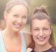 Half Body Shot of Two Happy Healthy Woman at the Park Showing Thumbs Up at the Camera After their Training.