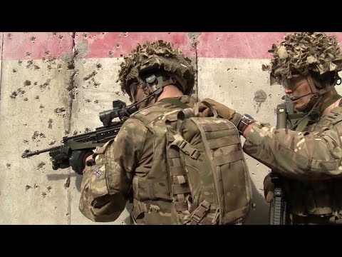 Apaches And Bullets Fly As British Troops Train In USA