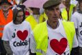 French business owners and locals blockade the main road into the Port of Calais as they await the arrival of a convoy ...