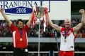 Swans coach Paul Roos and captain Barry Hall hold the trophy aloft after the 2005 AFL grand final against the West Coast ...