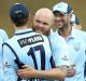 Resilient: Doug Bollinger celebrates the wicket of Tim Ludeman in NSW's Matador Cup clash with South Australia.