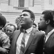 Muhammad Ali leaves the armed forces induction center with his entourage after refusing to be drafted into the armed forces in Houston, Texas, April 28, 1967. – Photo: AP