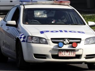 Police block Frankston Flinders Road in Somerville to investigate an alleged aggravated burglary.