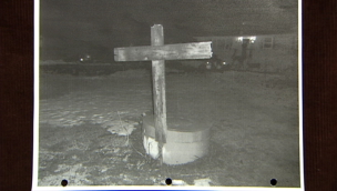 This RCMP photo shows the cross that the Rehberg brothers set fire to on Shayne Howe's and Michelle Lyon's front lawn.