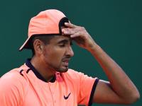 Nick Kyrgios of Canada reacts to his serve against