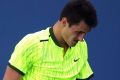 Stomach soreness has put the rest of Tomic's season in doubt. 
