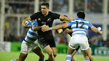 BUENOS AIRES, ARGENTINA - OCTOBER 01:  Anton Lienert-Brown of New Zealand is tackled by Santiago Gonzalez Iglesias of ...