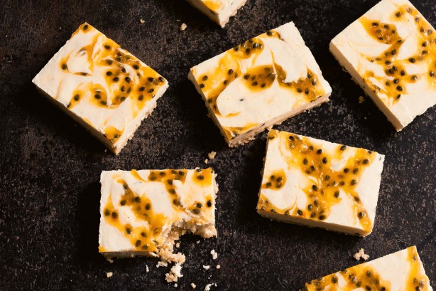 Passionfruit swirl cheesecake slice