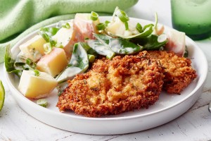 Rosemary beef schnitzels with snow pea and potato salad