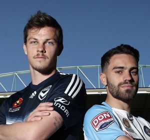 Anthony Caceres of Melbourne City and James Donachie of Melbourne Victory.
