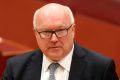 Attorney-General George Brandis is locked in a toxic feud with Solicitor-General Justin Gleeson SC.