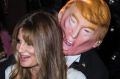 British journalist and heiress Jemima Khan poses for photographers with an effigy of Donald Trump at the Unicef ...