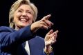 Democratic presidential candidate Hillary Clinton points to members of the audience after speaking at a fundraiser at ...