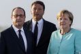 From left: French President Francois Hollande, Italian Prime Minister Matteo Renzi and German Chancellor Angela Merkel ...