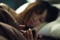 Reading your smartphone with one eye open at night could lead to temporary blindness.