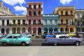 Havana, ??uba - February 12, 2013: Vintage cars moving on the streets of colorful Havana. A great variety of old cars ...