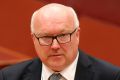 Attorney-General George Brandis is locked in a toxic feud with Solicitor-General Justin Gleeson SC.