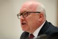 Attorney-General Senator George Brandis fronts the Senate inquiry on Friday.