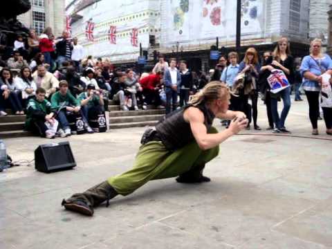 Best ! !! Street performer with glass orb, on Wedding day of Prince William,  Piccadilly Circus