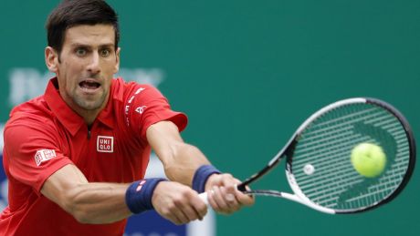 Novak Djokovic returns a shot against Mischa Zverev in the quarter-finals of the  Shanghai Masters.