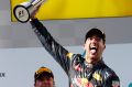 Winner, winner: Red Bull driver Daniel Ricciardo celebrates after winning the Malaysian Grand Prix.