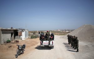 Palestinian Hamas security forces on the Palestinian side of the border with Egypt in Rafah, southern Gaza Strip, Thursday, April 21, 2016.