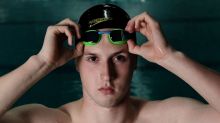 Portrait of Matthew Wilson at Sydney Olympic Aquatic centre, he is studying for his HSC while also competing at the ...