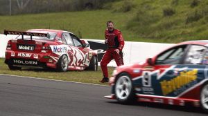 Rivals, now teammates: Mark Skaife swears at Russell Ingall in their infamous 2003 clash.