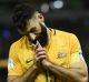 Saved a point: Mile Jedinak scored Australia's only goal against Japan. 