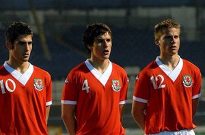 Aaron Ramsey lines up for Wales U21's alongside Christian Ribeiro (right) and Ched Evans (left)